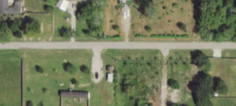 Fenced Agricultural Acreage with Barns