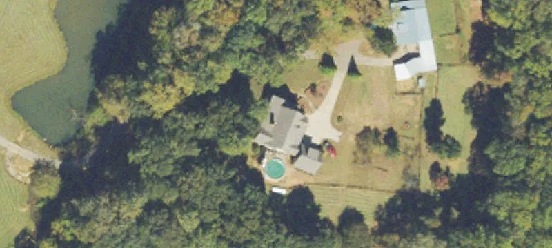 Custom Farmstead with Private Lake