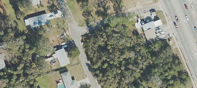 Fenced Highway Commercial Lot