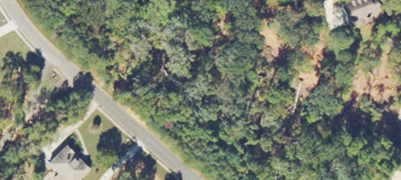 Wooded Residential Lot with Long Frontage