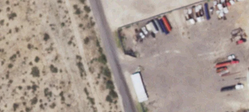 Truck Yard with Metal Workshop