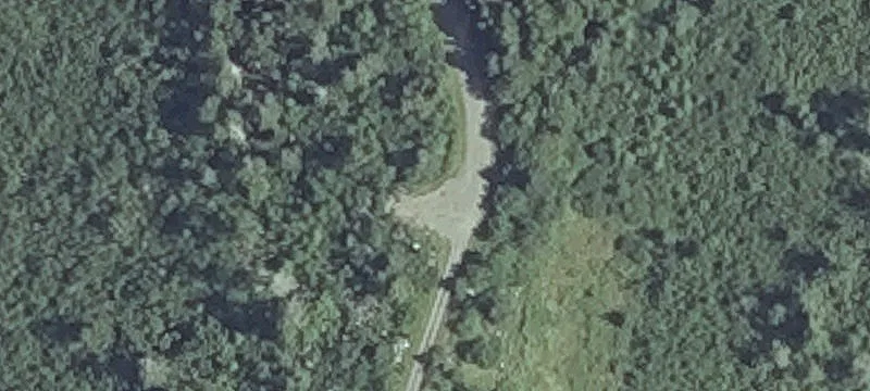 Acreage with Creek and Steel Building