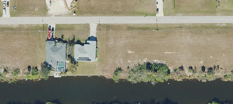 Cleared Canal-Adjacent Home Site