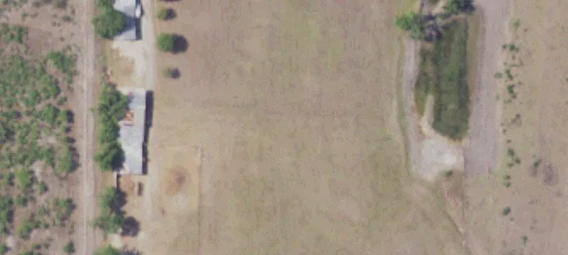 Leveled Clear Land with Dry Pond