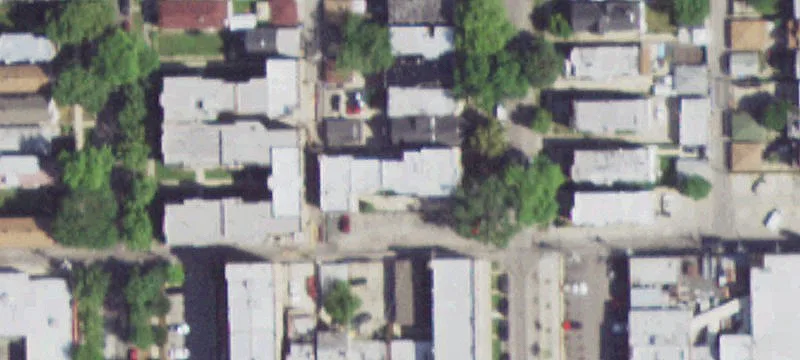 L-Shaped Apartment Building with Parking