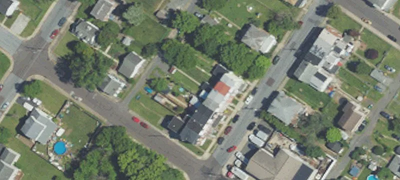 Corner Triplex with Two-Bed Units
