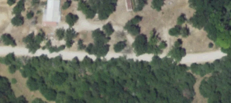 Fenced Agricultural Acreage with Barn