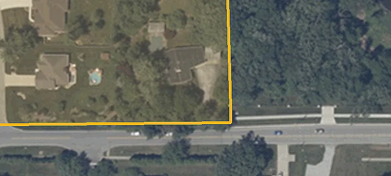 Gated Acreage Lot with Pond View