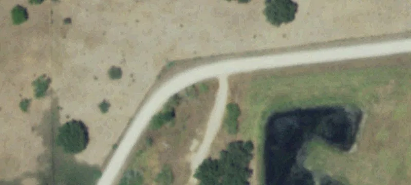 Fenced Raw Land with Pond