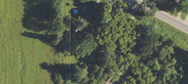 Two-Parcel Farmland Fronting Railroad Street