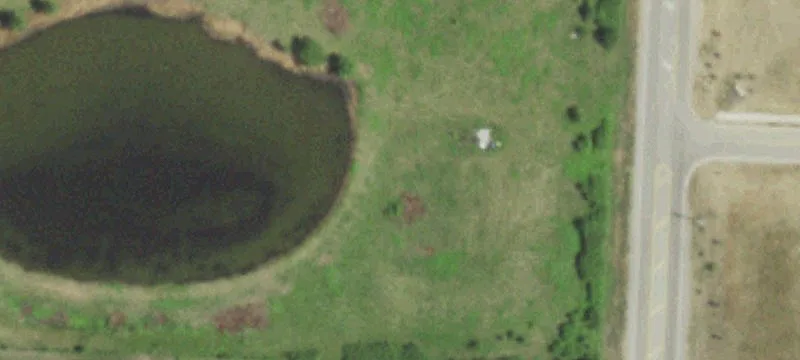 Acreage Zoned Agricultural with Pond