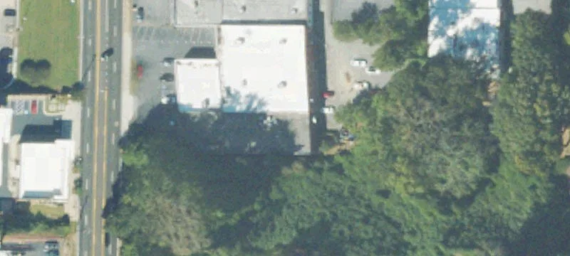 Covered-Land Retail Building with Parking
