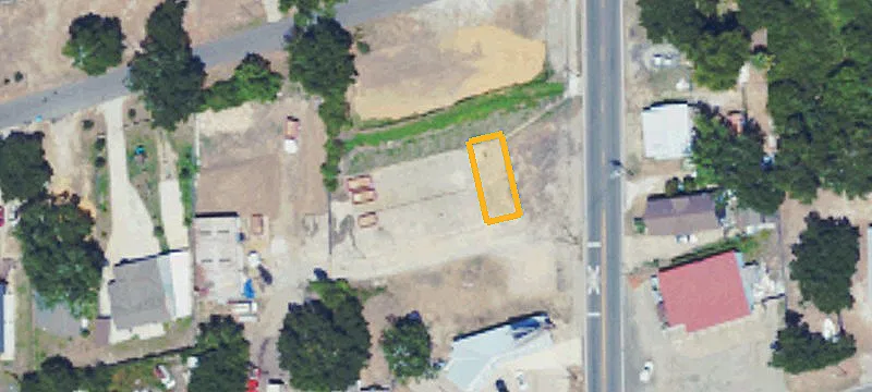 Unimproved Acreage with Metal Warehouse
