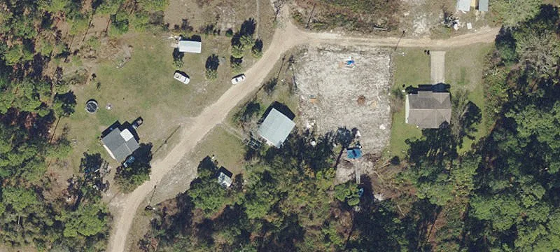 Vacant Land with Single-Family Structure