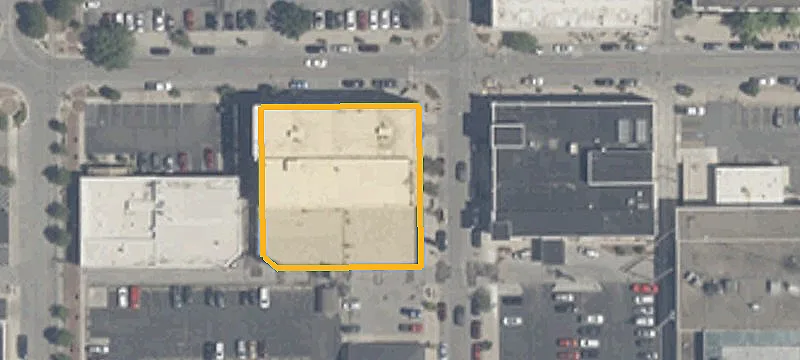 Zoned Land with Brick Building