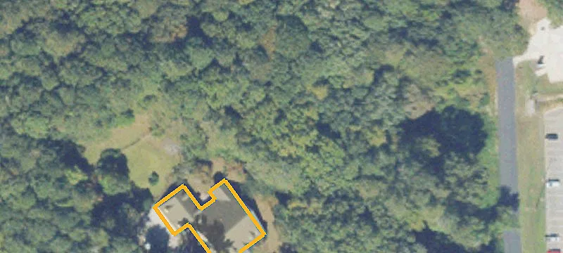 Developable Commercial Land with Building