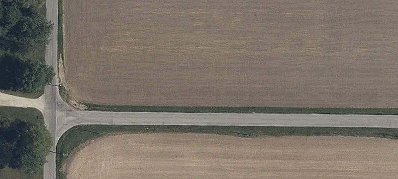 Country Land with Pond and Outbuilding