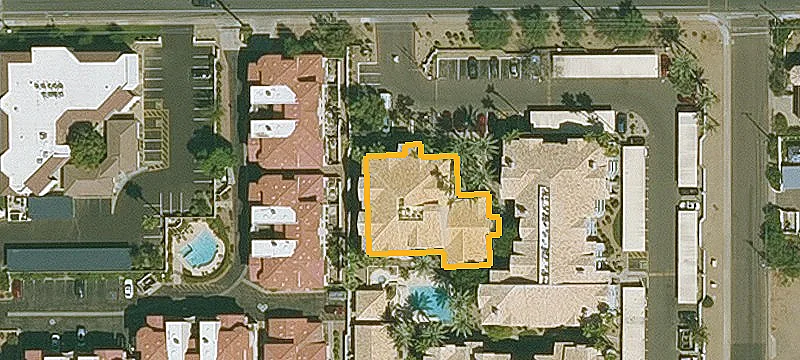 Top-Floor Corner Condo with Covered Parking