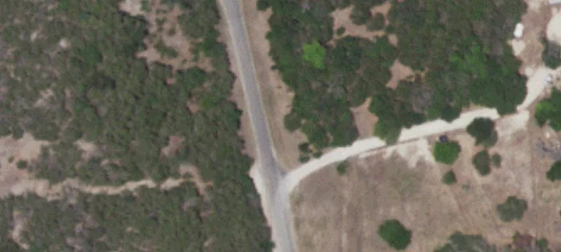 Wooded Waterfront Land Parcel