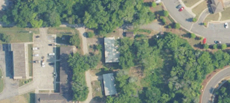 Occupied Triplex with Light Industrial Zoning