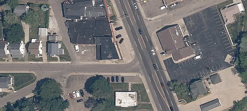 Mixed-Use Plaza with Vacant Restaurant