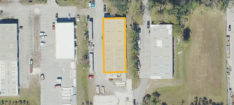 Fenced Industrial Warehouse with Storage