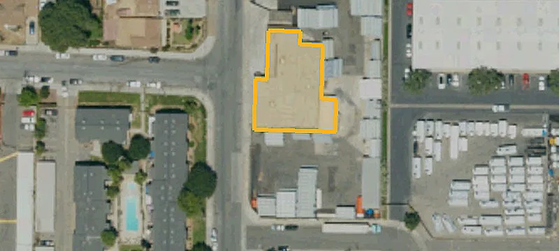 Warehouse with Fenced Concrete Yard