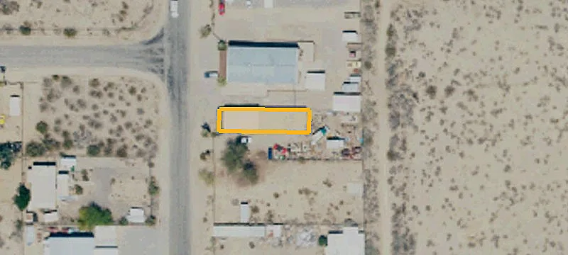 Fully Fenced Commercial Land with Two Buildings