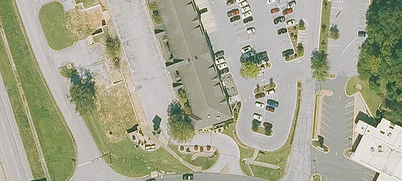 Shopping Center Anchored by Harp's Food Store