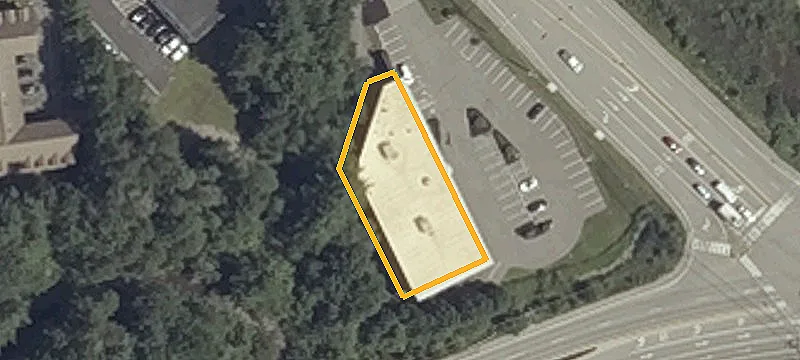 Freestanding Retail Building with Pylon Sign