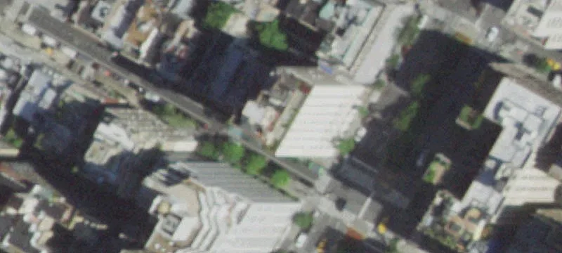 Five-Story Apartment Building with Rooftop Terrace