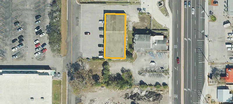 Strip Mall with Adjacent Vacant Lot