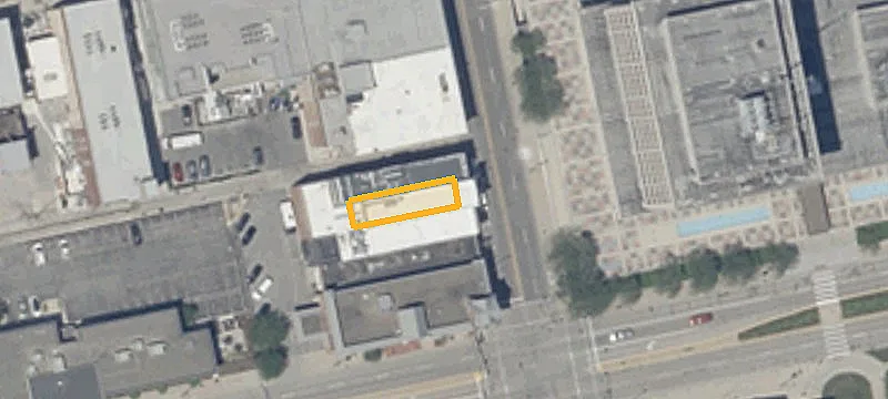 Storefront Building with Rooftop Views