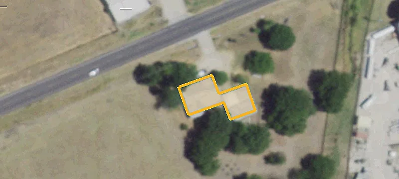 Industrial Land Tract with Farmhouse