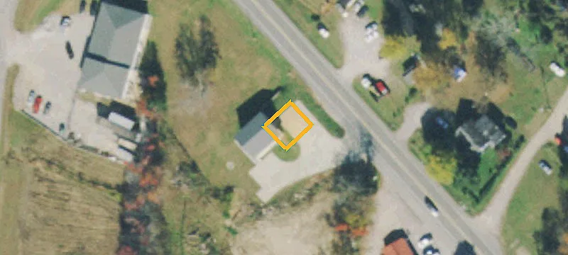 Two-Story Brick Office Building with Vacant Land