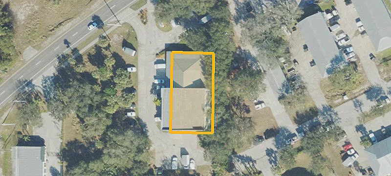 Warehouse with Concrete-Paved Parking Lot