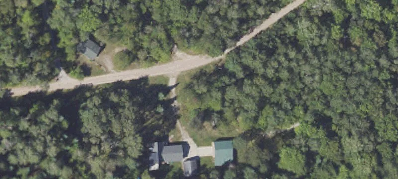 Wooded Farmland Parcel with Pole Barn