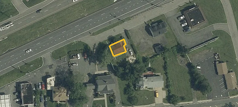 Highway-Front Office Building with Potential Suites