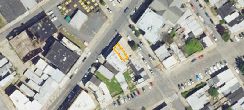 Mixed-Use Triplex with Rooftop Deck