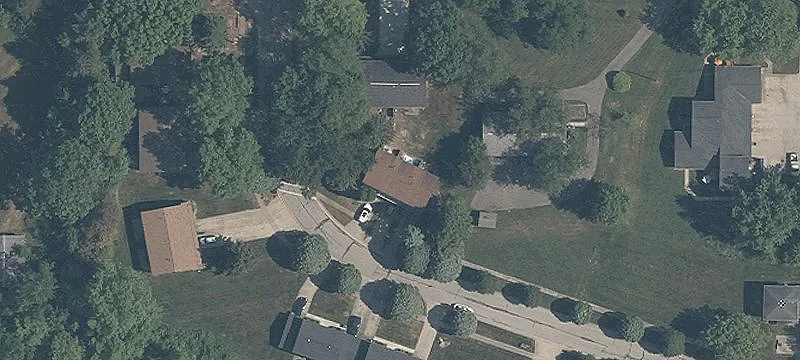 Updated Triplex with Attached Garages