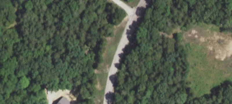 Wooded Farm With Creek and Pond