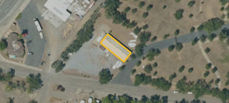 Fenced Warehouse with Roll-Up Doors