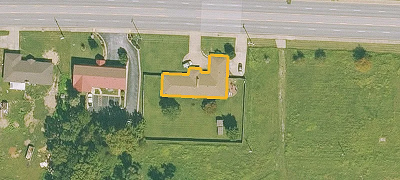Commercial Land with Brick Improvements
