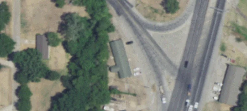 Fenced Commercial Land with Improvements