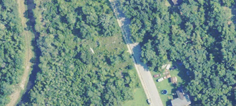 Waterfront Land with Commercial Improvements
