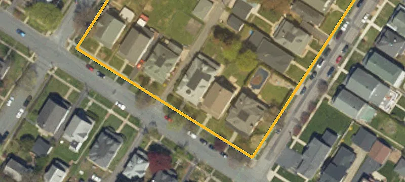 Well-Maintained Triplex with Hardwood Floors