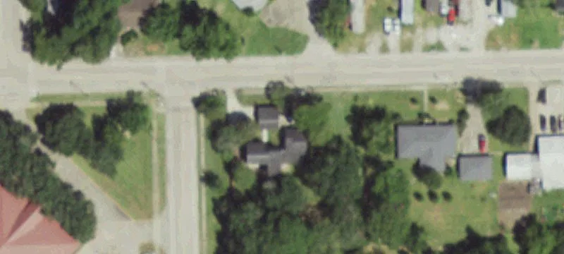 Corner-Lot Duplex With Garages