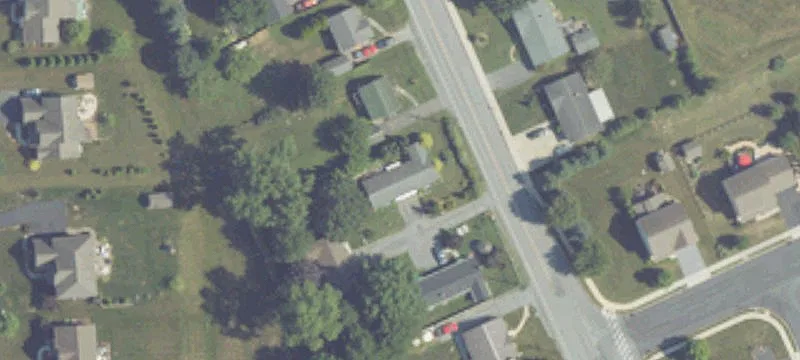 All-Brick Duplex With Paved Driveway