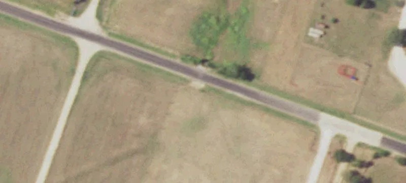 Fenced Farm with Limestone Home