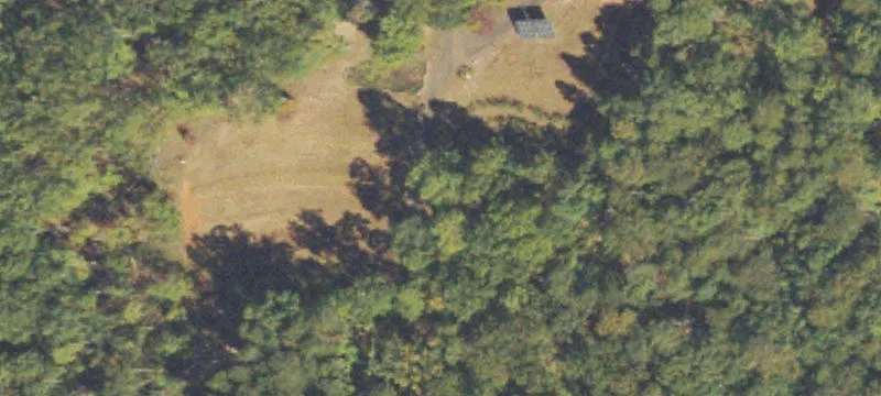 Mountain Farm with Greenhouses